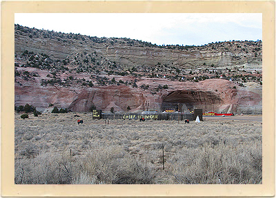 This is the location that was used for the Indian Cliff Dwellings scenes in "Ace in the Hole." The then-active, real life trading post sits in front of the beautiful red rock formation.