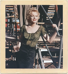 Marilyn Monroe poses for publicity shots at the Arizona State Fairgrounds rodeo grandstand. She was promoting the upcoming film, “Bus Stop.”