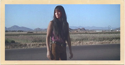 Cher (in tears) stands on the highway at one of the many Phoenix, Arizona, locations used for her first starring role in the movie, “Chastity.”