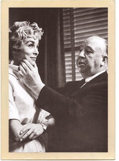 Janet Leigh seems amused at Alfred Hitchcock’s direction during the filming of the “hotel scene” in the masterpiece thriller, “Psycho.”
